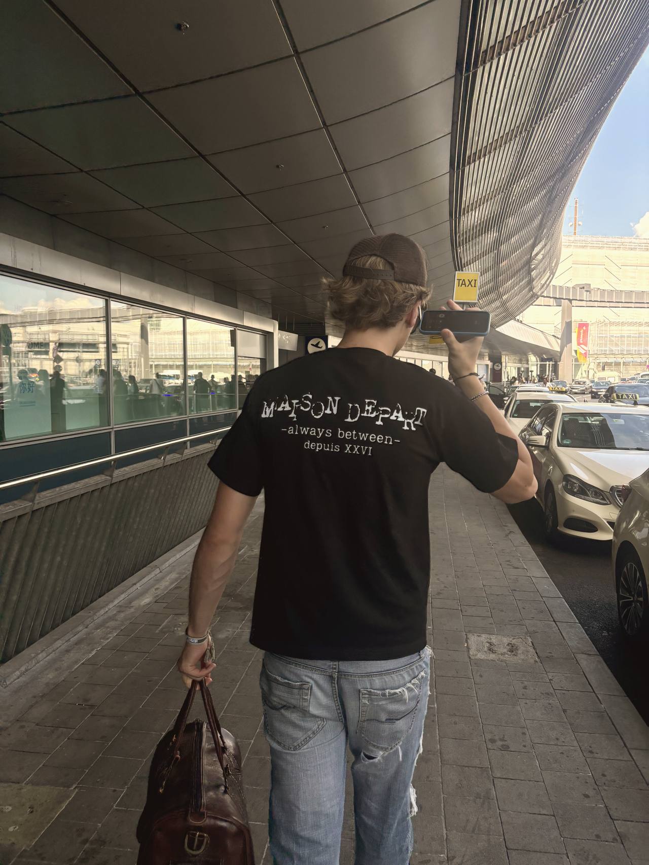 Maison Depart — worn, taxi rank